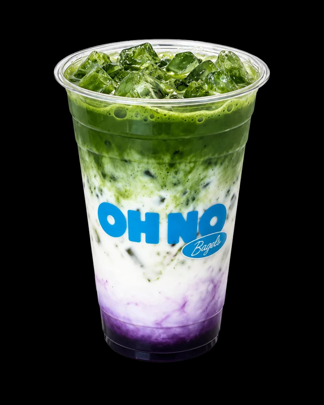 Iced Ube Matcha with layers of ube, milk, and matcha